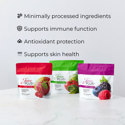 Three Juice Plus+ Chewable packages on a white surface with text highlighting benefits.