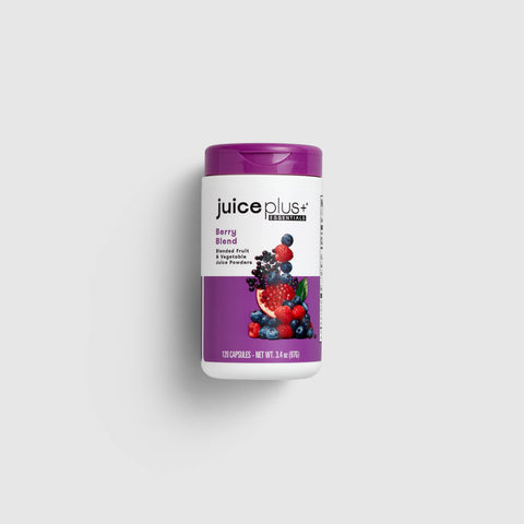 A container of Juice Plus+ Berry Blend capsules.