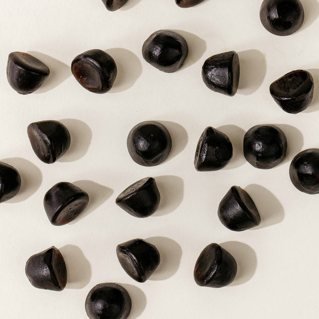 Pattern of Juice Plus+ Chewables on a light background