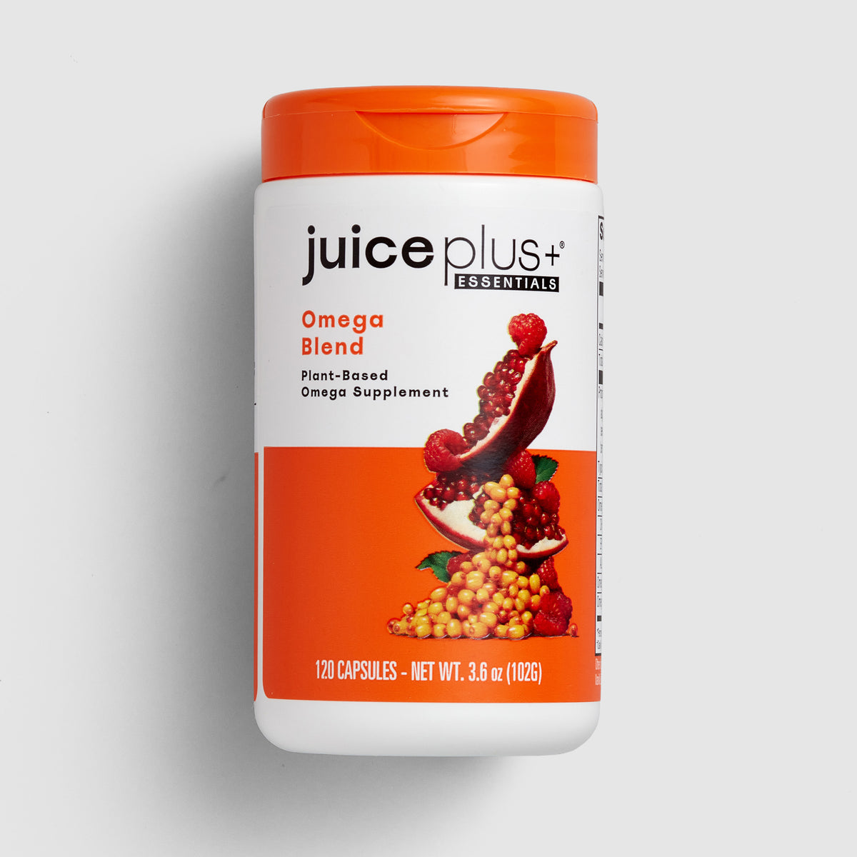 Juice Plus+ Omega Blend supplement container on a light gray background