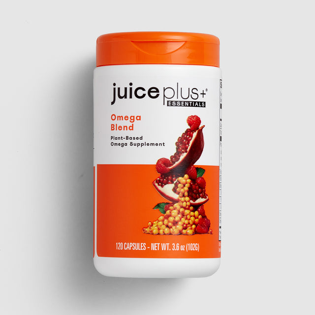 Juice Plus+ Omega Blend supplement container on a light gray background