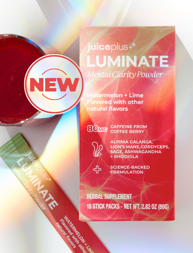Juiceplus Luminate Mental Clarity Powder box in Watermelon + Lime flavor, shown with a single stick pack and a red powder cup on a white background with a colorful light flare effect and a 'NEW' badge overlay.