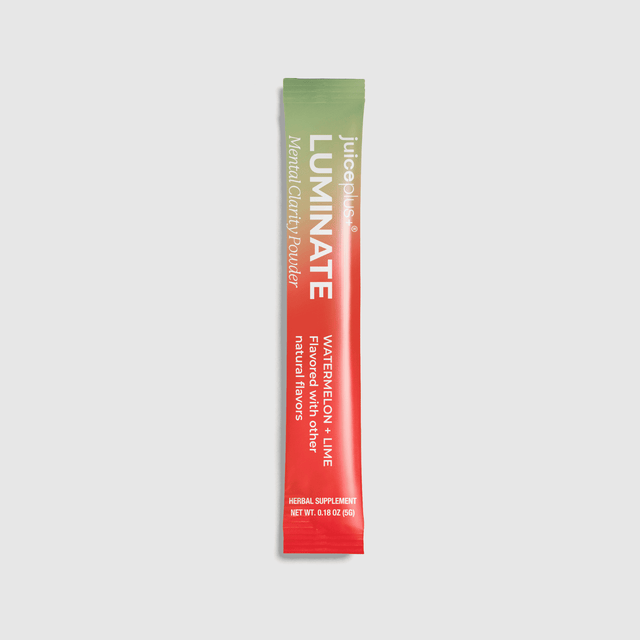 A single vertical stick pack of judoplus LUMINATE herbal clarified powder, watermelon + lime flavored, shown on a light gray background.