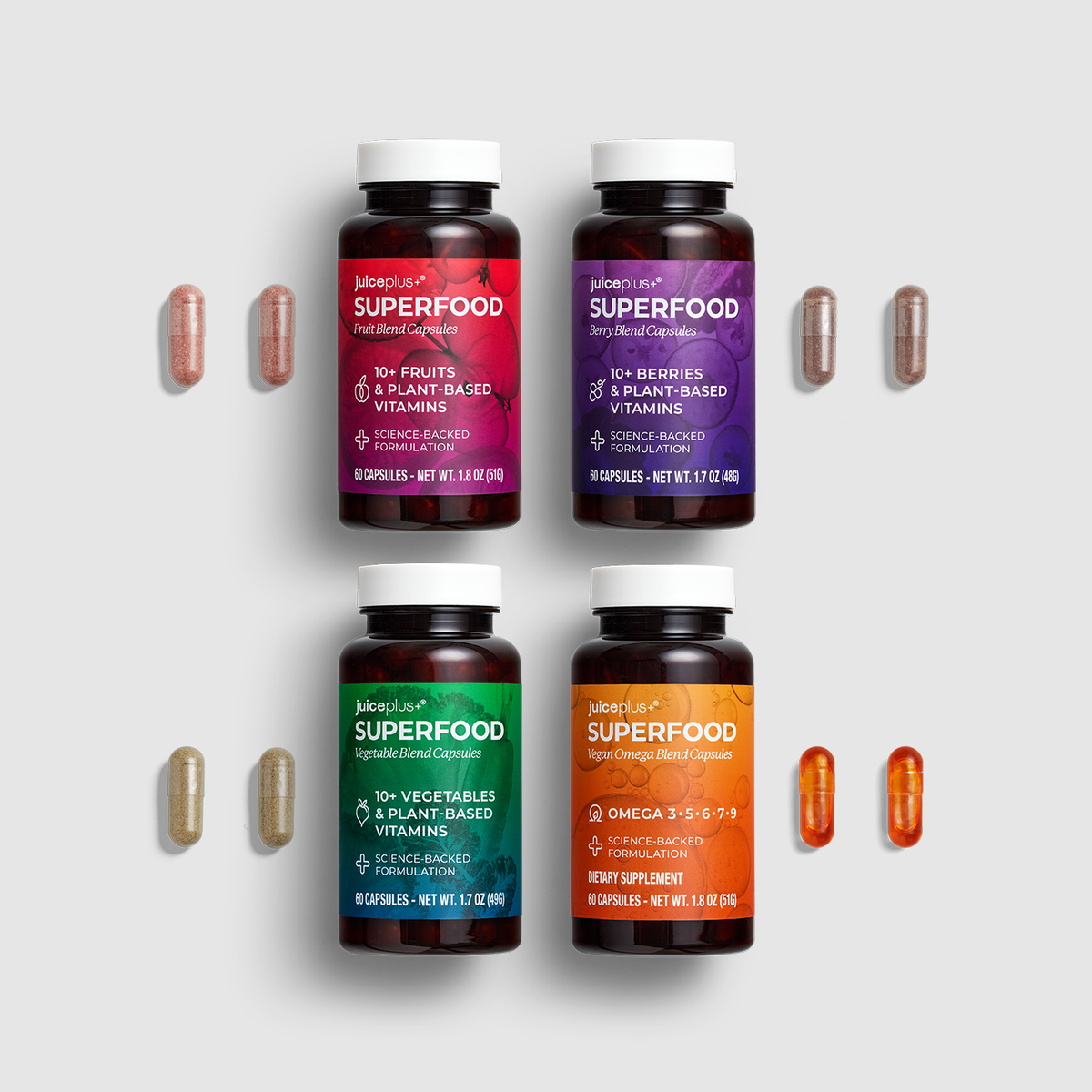 Four dark amber supplement bottles labeled 'Jabbers Nutrients Superfood' arranged in a 2x2 grid on a light gray background, with matching capsules placed beside each bottle.